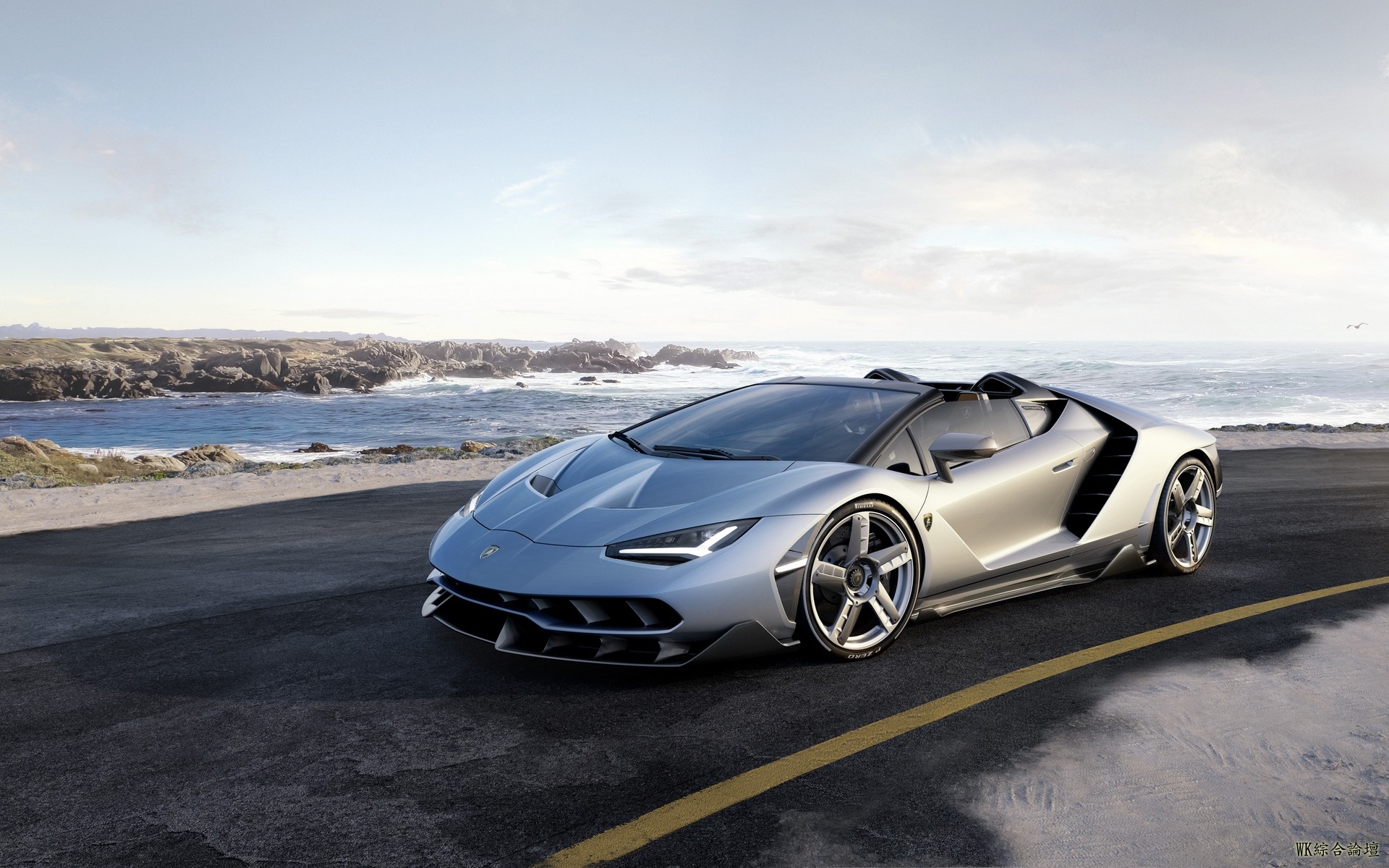 lamborghini_roadster_road_sea_stones_111467_1920x1200.jpg